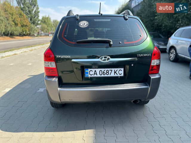 Зелений Хендай Туксон, об'ємом двигуна 1.98 л та пробігом 147 тис. км за 9200 $, фото 6 на Automoto.ua
