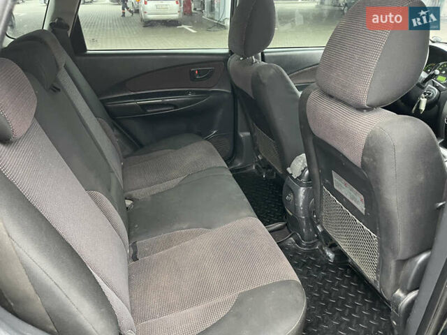 Зеленый Хендай Туксон, объемом двигателя 1.98 л и пробегом 295 тыс. км за 5950 $, фото 21 на Automoto.ua