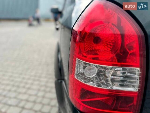 Зеленый Хендай Туксон, объемом двигателя 2 л и пробегом 302 тыс. км за 6990 $, фото 5 на Automoto.ua