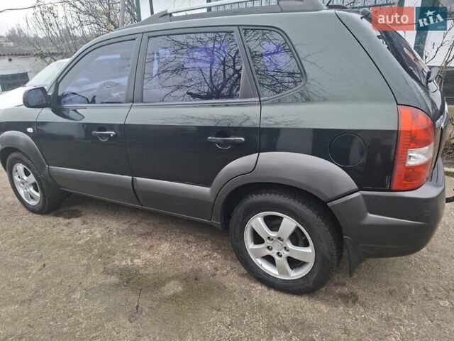 Зеленый Хендай Туксон, объемом двигателя 2 л и пробегом 228 тыс. км за 6500 $, фото 1 на Automoto.ua