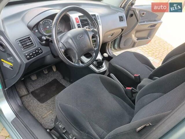 Зеленый Хендай Туксон, объемом двигателя 2 л и пробегом 166 тыс. км за 8800 $, фото 43 на Automoto.ua
