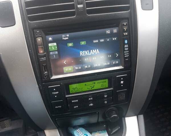 Зелений Хендай Туксон, об'ємом двигуна 1.99 л та пробігом 281 тис. км за 8500 $, фото 2 на Automoto.ua