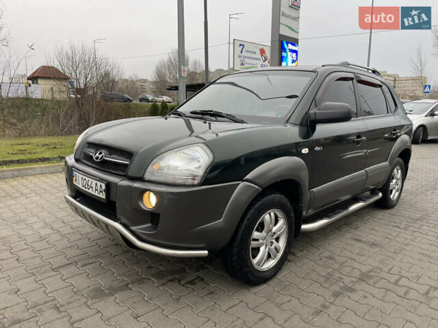 Зеленый Хендай Туксон, объемом двигателя 1.98 л и пробегом 295 тыс. км за 5950 $, фото 12 на Automoto.ua