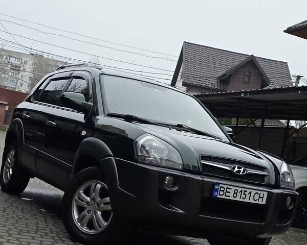 Зеленый Хендай Туксон, объемом двигателя 1.98 л и пробегом 178 тыс. км за 8900 $, фото 4 на Automoto.ua