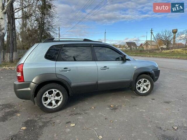 Зеленый Хендай Туксон, объемом двигателя 1.98 л и пробегом 168 тыс. км за 8800 $, фото 8 на Automoto.ua