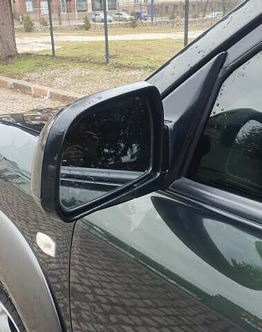 Зеленый Хендай Туксон, объемом двигателя 2 л и пробегом 115 тыс. км за 8500 $, фото 9 на Automoto.ua