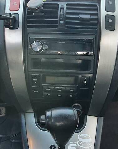 Зеленый Хендай Туксон, объемом двигателя 2 л и пробегом 115 тыс. км за 8500 $, фото 59 на Automoto.ua