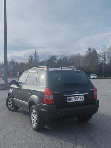 Зеленый Хендай Туксон, объемом двигателя 1.98 л и пробегом 220 тыс. км за 6800 $, фото 6 на Automoto.ua