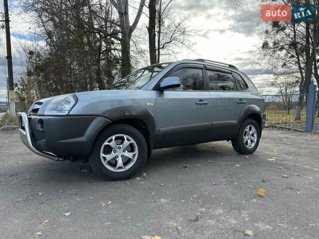Зеленый Хендай Туксон, объемом двигателя 1.98 л и пробегом 168 тыс. км за 8800 $, фото 17 на Automoto.ua