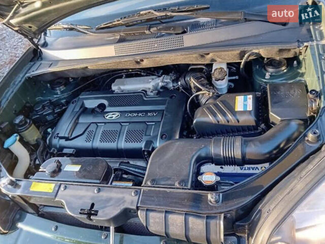 Зеленый Хендай Туксон, объемом двигателя 2 л и пробегом 183 тыс. км за 8900 $, фото 11 на Automoto.ua