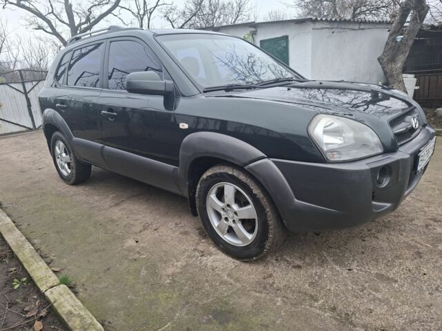 Зеленый Хендай Туксон, объемом двигателя 2 л и пробегом 228 тыс. км за 6500 $, фото 1 на Automoto.ua