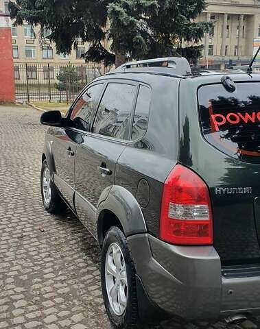 Зеленый Хендай Туксон, объемом двигателя 2 л и пробегом 115 тыс. км за 8500 $, фото 5 на Automoto.ua