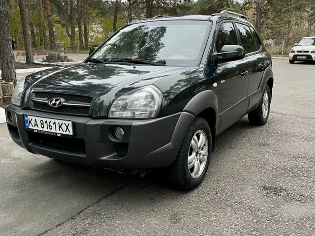 Зеленый Хендай Туксон, объемом двигателя 2.7 л и пробегом 201 тыс. км за 8400 $, фото 1 на Automoto.ua