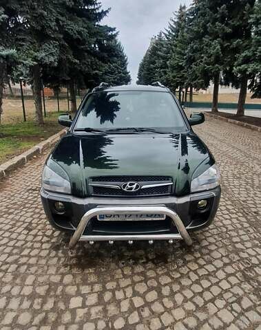 Зеленый Хендай Туксон, объемом двигателя 2 л и пробегом 115 тыс. км за 8500 $, фото 1 на Automoto.ua