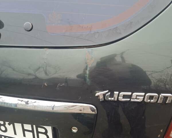 Зеленый Хендай Туксон, объемом двигателя 2 л и пробегом 228 тыс. км за 6500 $, фото 14 на Automoto.ua