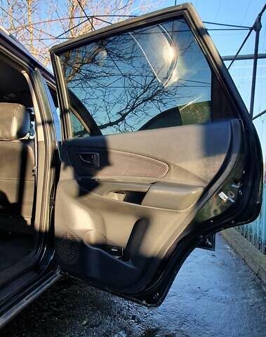 Зеленый Хендай Туксон, объемом двигателя 2 л и пробегом 115 тыс. км за 8500 $, фото 82 на Automoto.ua