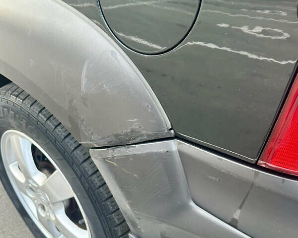 Зелений Хендай Туксон, об'ємом двигуна 1.98 л та пробігом 156 тис. км за 7999 $, фото 7 на Automoto.ua