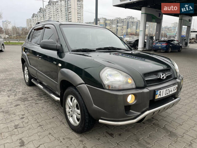 Зеленый Хендай Туксон, объемом двигателя 1.98 л и пробегом 295 тыс. км за 5950 $, фото 10 на Automoto.ua