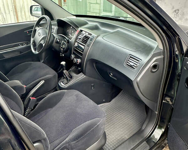 Зелений Хендай Туксон, об'ємом двигуна 1.98 л та пробігом 156 тис. км за 7999 $, фото 16 на Automoto.ua