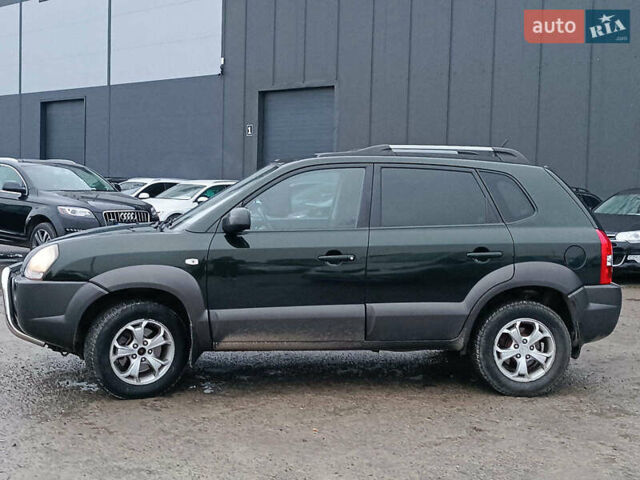 Зеленый Хендай Туксон, объемом двигателя 2 л и пробегом 223 тыс. км за 7290 $, фото 4 на Automoto.ua