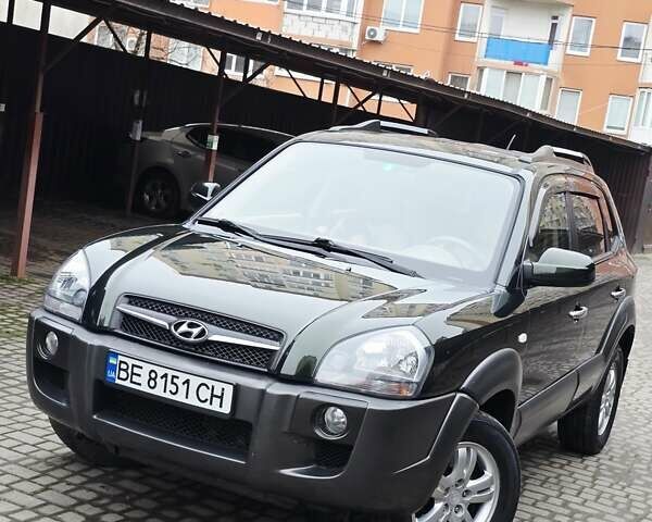 Зеленый Хендай Туксон, объемом двигателя 1.98 л и пробегом 178 тыс. км за 8900 $, фото 21 на Automoto.ua