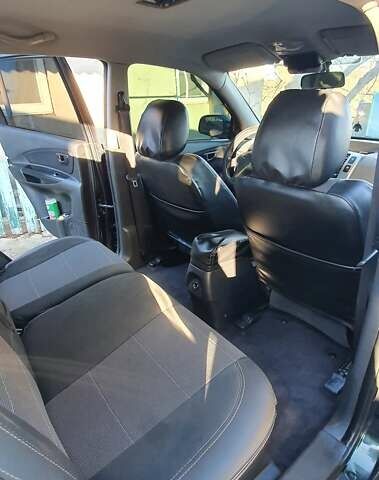 Зеленый Хендай Туксон, объемом двигателя 2 л и пробегом 115 тыс. км за 8500 $, фото 81 на Automoto.ua