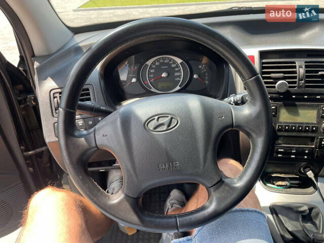 Зеленый Хендай Туксон, объемом двигателя 1.98 л и пробегом 180 тыс. км за 9200 $, фото 13 на Automoto.ua