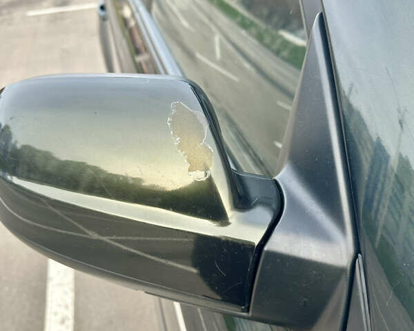 Зелений Хендай Туксон, об'ємом двигуна 1.98 л та пробігом 156 тис. км за 7999 $, фото 9 на Automoto.ua