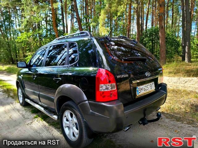 Зеленый Хендай Туксон, объемом двигателя 2 л и пробегом 190 тыс. км за 8500 $, фото 2 на Automoto.ua
