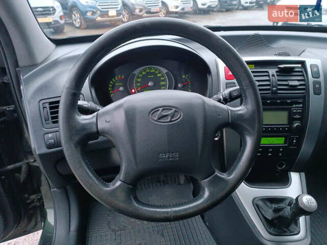 Зеленый Хендай Туксон, объемом двигателя 2 л и пробегом 223 тыс. км за 7290 $, фото 20 на Automoto.ua