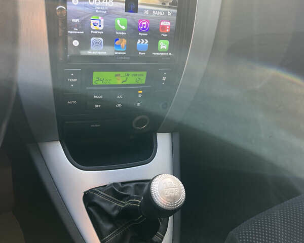 Зеленый Хендай Туксон, объемом двигателя 1.98 л и пробегом 130 тыс. км за 9100 $, фото 11 на Automoto.ua