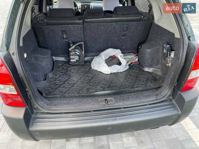 Зеленый Хендай Туксон, объемом двигателя 1.98 л и пробегом 180 тыс. км за 9200 $, фото 12 на Automoto.ua