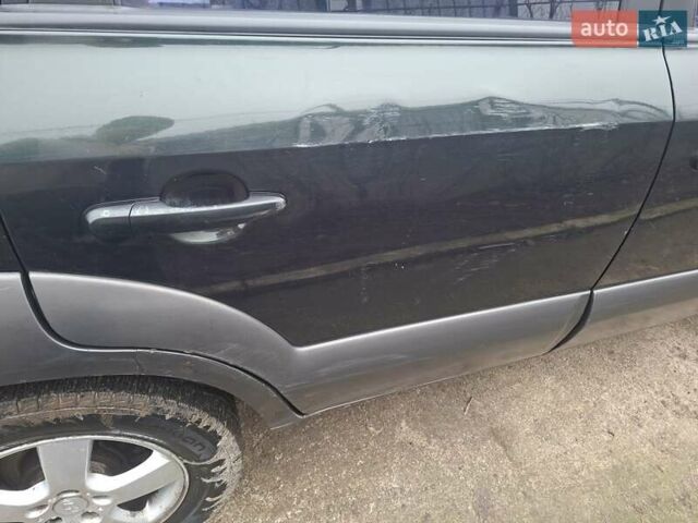 Зеленый Хендай Туксон, объемом двигателя 2 л и пробегом 228 тыс. км за 6500 $, фото 17 на Automoto.ua