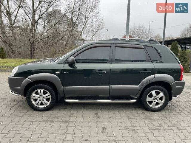 Зеленый Хендай Туксон, объемом двигателя 1.98 л и пробегом 295 тыс. км за 5950 $, фото 2 на Automoto.ua