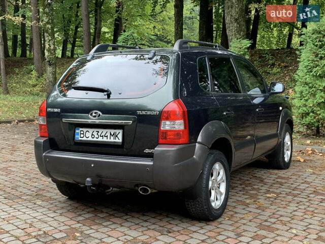 Зеленый Хендай Туксон, объемом двигателя 1.98 л и пробегом 230 тыс. км за 7999 $, фото 26 на Automoto.ua