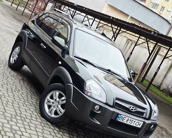 Зеленый Хендай Туксон, объемом двигателя 1.98 л и пробегом 178 тыс. км за 8900 $, фото 30 на Automoto.ua