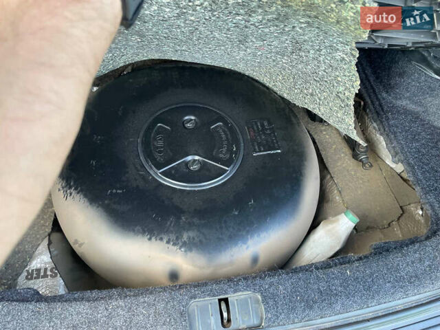 Зеленый Хендай Туксон, объемом двигателя 1.98 л и пробегом 180 тыс. км за 9200 $, фото 14 на Automoto.ua