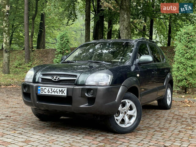 Зеленый Хендай Туксон, объемом двигателя 1.98 л и пробегом 230 тыс. км за 7999 $, фото 11 на Automoto.ua