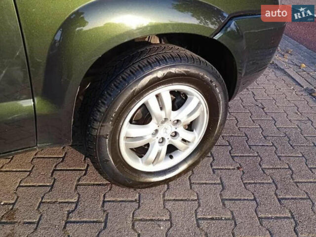 Зеленый Хендай Туксон, объемом двигателя 2 л и пробегом 183 тыс. км за 8900 $, фото 9 на Automoto.ua