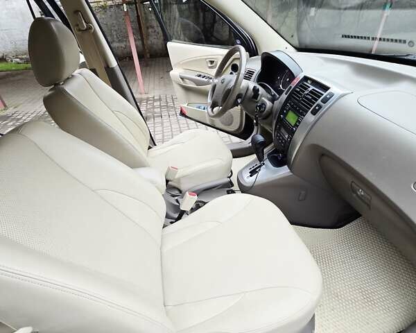 Зеленый Хендай Туксон, объемом двигателя 1.98 л и пробегом 178 тыс. км за 8900 $, фото 32 на Automoto.ua