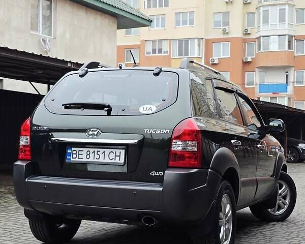 Зеленый Хендай Туксон, объемом двигателя 1.98 л и пробегом 178 тыс. км за 8900 $, фото 18 на Automoto.ua