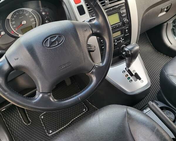 Зеленый Хендай Туксон, объемом двигателя 2.66 л и пробегом 166 тыс. км за 8500 $, фото 5 на Automoto.ua