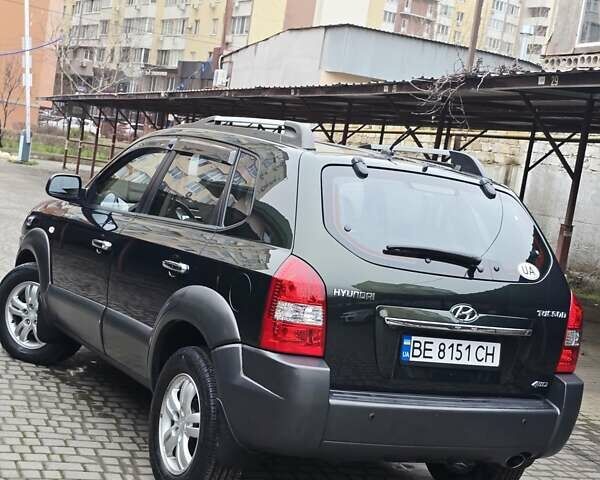 Зеленый Хендай Туксон, объемом двигателя 1.98 л и пробегом 178 тыс. км за 8900 $, фото 5 на Automoto.ua