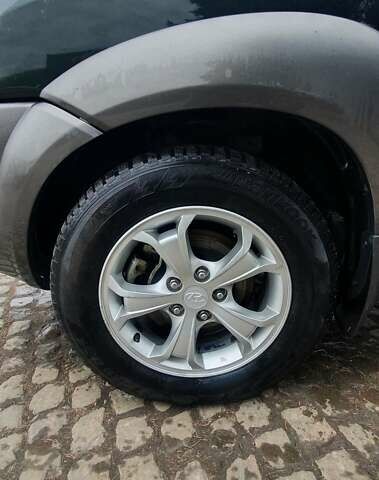 Зеленый Хендай Туксон, объемом двигателя 2 л и пробегом 115 тыс. км за 8500 $, фото 35 на Automoto.ua