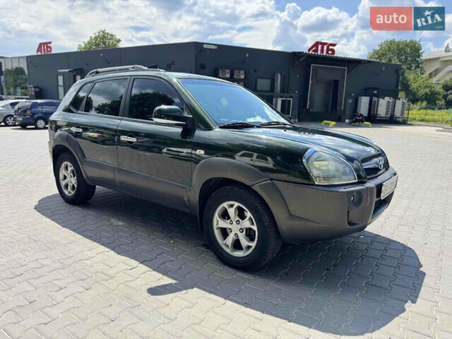 Зеленый Хендай Туксон, объемом двигателя 2.66 л и пробегом 200 тыс. км за 8199 $, фото 8 на Automoto.ua