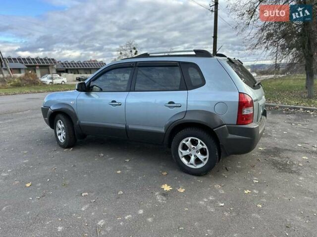 Зеленый Хендай Туксон, объемом двигателя 1.98 л и пробегом 168 тыс. км за 8800 $, фото 26 на Automoto.ua