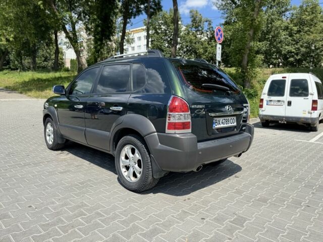 Зеленый Хендай Туксон, объемом двигателя 2.7 л и пробегом 200 тыс. км за 8500 $, фото 4 на Automoto.ua