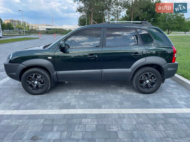 Зеленый Хендай Туксон, объемом двигателя 1.98 л и пробегом 180 тыс. км за 9200 $, фото 8 на Automoto.ua