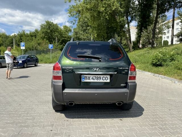 Зеленый Хендай Туксон, объемом двигателя 2.7 л и пробегом 200 тыс. км за 8500 $, фото 3 на Automoto.ua