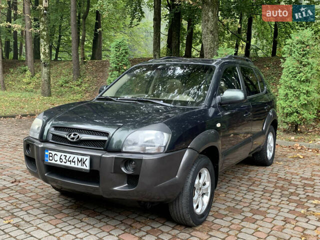 Зеленый Хендай Туксон, объемом двигателя 1.98 л и пробегом 230 тыс. км за 7999 $, фото 12 на Automoto.ua